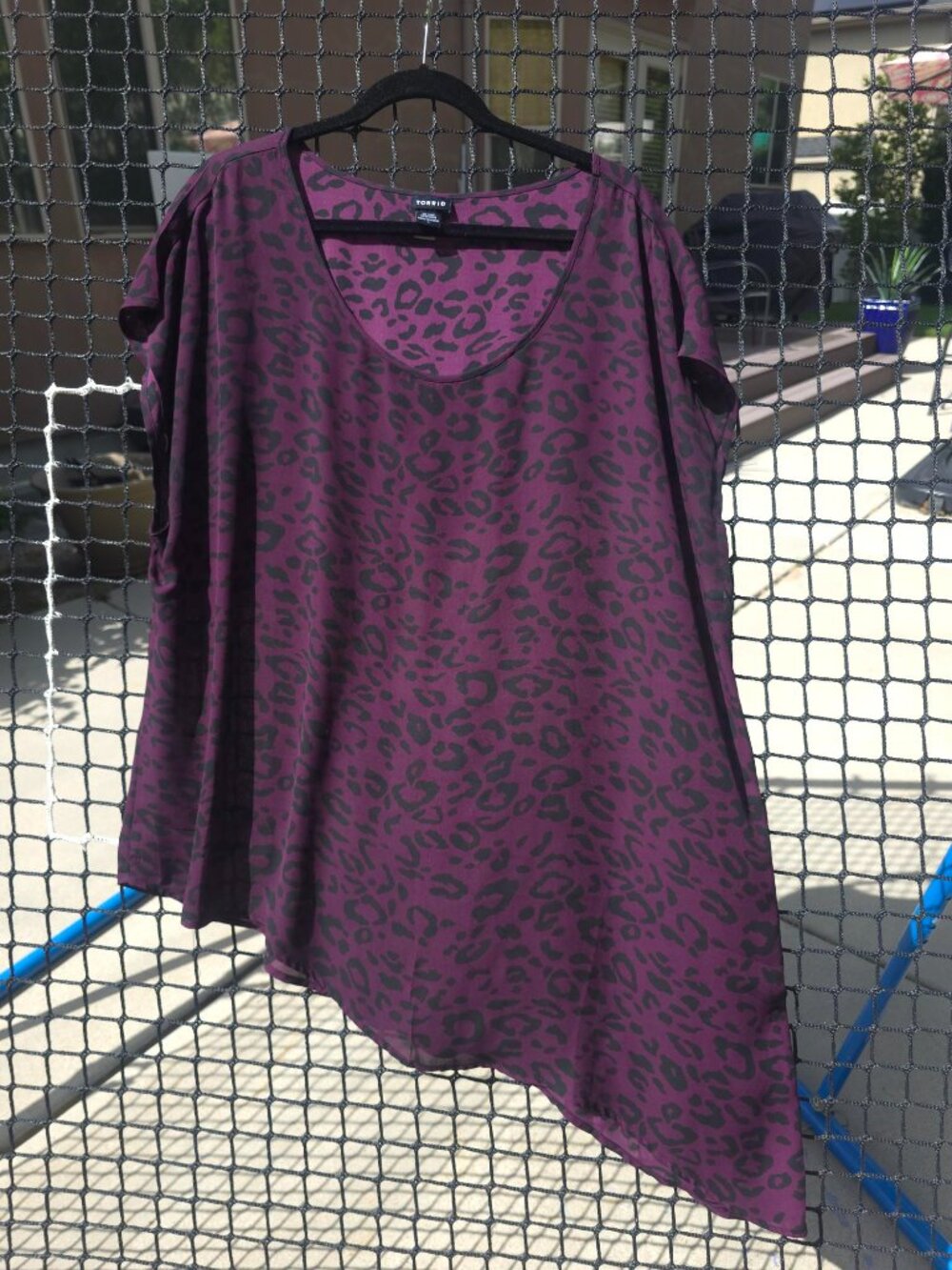 Purple cheetah asymmetrical top - Torrid Size 2
